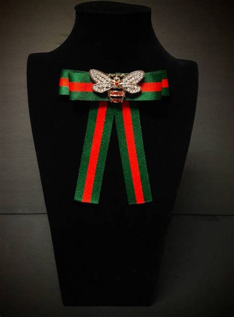 gucci bow tie|Gucci bow tie brooch.